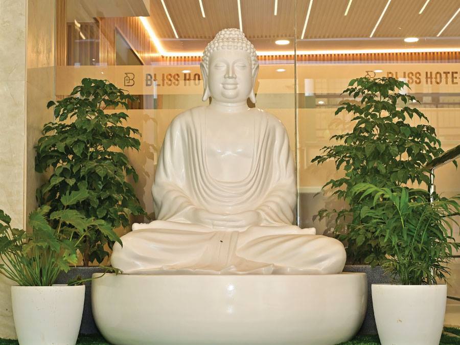 White Buddha statue in the hotel lobby